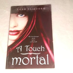 A Touch Mortal, a paperback book written by Leah Clifford
